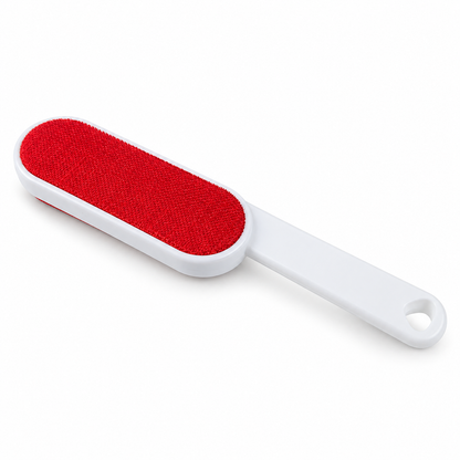 Red double-sided velour lint brush with white handle