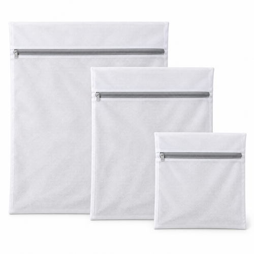 Three white mesh laundry bags in large, medium and small sizes